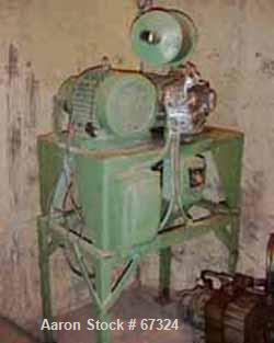 USED: Davis Standard 4.5" single screw extruder, model 45-T. 24:1 L/D ratio, 43" center line, 4 zone electrically heated, air cooled barrel, 4-1/2" x 6" feed throat (no hopper). No motor. Unit includ...