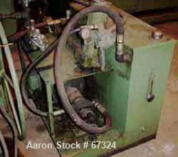 USED: Davis Standard 4.5" single screw extruder, model 45-T. 24:1 L/D ratio, 43" center line, 4 zone electrically heated, air cooled barrel, 4-1/2" x 6" feed throat (no hopper). No motor. Unit includ...