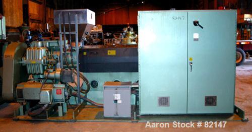 USED: Davis Standard 4.5" single screw extruder, model 45IN45T, approx 30:1 L/D ratio. Electrically heated, air cooled, 6 zone vented (plugged) barrel, water cooled feed throat with hopper. Driven by...