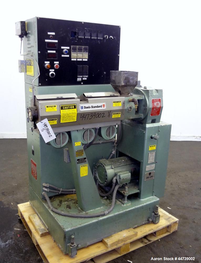 Used Davis Standard 1-1/4" Single Screw Extruder, Model DS-12-HM. Approximate 24 to 1 L/D Ratio. Electrically heated, air cooled 3 zone top vented barrel (plugged). Water cooled feed throat with hopp...