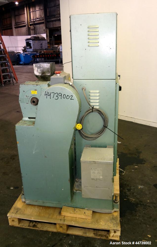 Used Davis Standard 1-1/4" Single Screw Extruder, Model DS-12-HM. Approximate 24 to 1 L/D Ratio. Electrically heated, air cooled 3 zone top vented barrel (plugged). Water cooled feed throat with hopp...