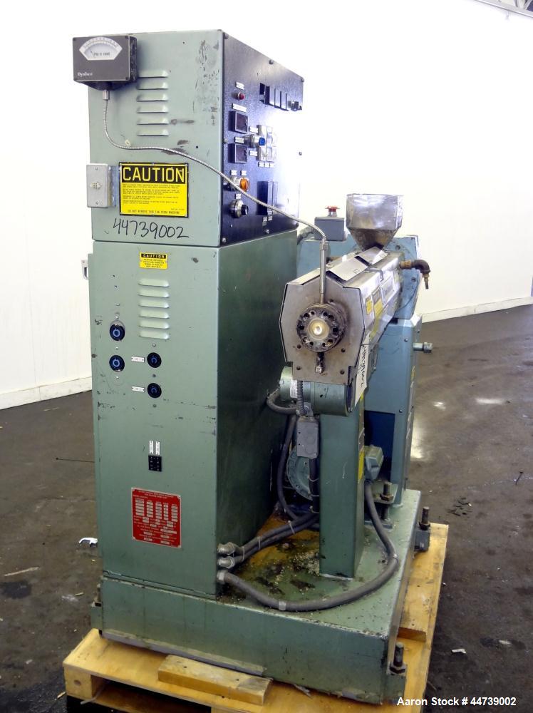 Used Davis Standard 1-1/4" Single Screw Extruder, Model DS-12-HM. Approximate 24 to 1 L/D Ratio. Electrically heated, air cooled 3 zone top vented barrel (plugged). Water cooled feed throat with hopp...
