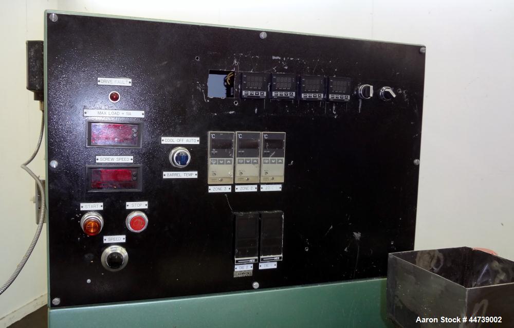 Used Davis Standard 1-1/4" Single Screw Extruder, Model DS-12-HM. Approximate 24 to 1 L/D Ratio. Electrically heated, air cooled 3 zone top vented barrel (plugged). Water cooled feed throat with hopp...