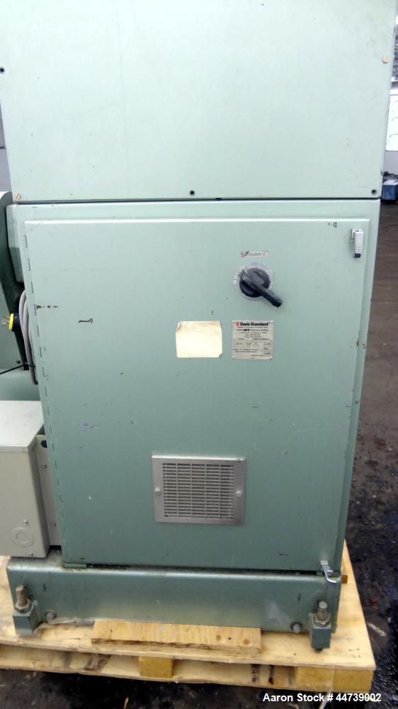 Used Davis Standard 1-1/4" Single Screw Extruder, Model DS-12-HM. Approximate 24 to 1 L/D Ratio. Electrically heated, air cooled 3 zone top vented barrel (plugged). Water cooled feed throat with hopp...