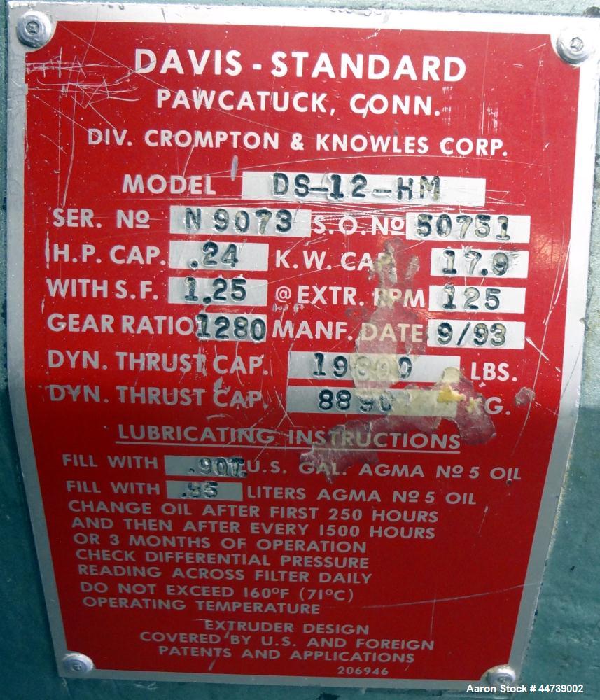 Used Davis Standard 1-1/4" Single Screw Extruder, Model DS-12-HM. Approximate 24 to 1 L/D Ratio. Electrically heated, air cooled 3 zone top vented barrel (plugged). Water cooled feed throat with hopp...