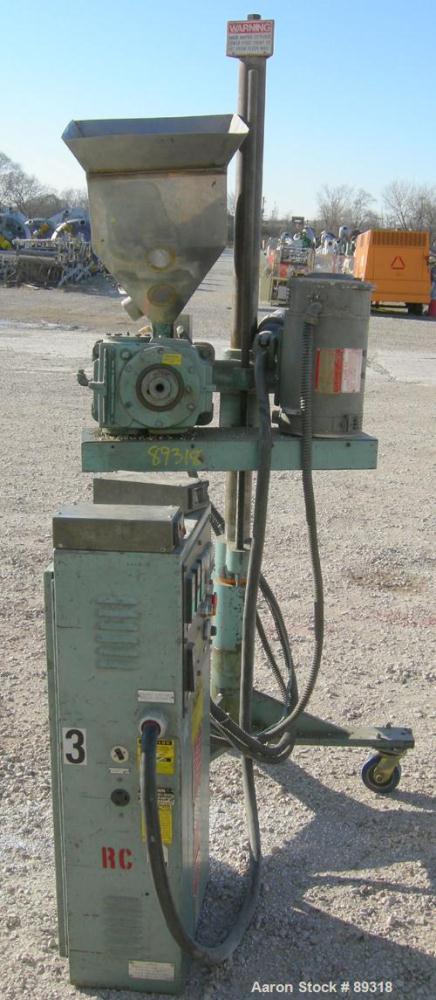 Used Davis Standard 1.25" Pedestal Mounted Single Screw Extruder, Model DS1.25, approximate 24:1 L/D ratio. Electrically heated, air cooled 3 zone non-vented barrel. Water cooled feed throat with hop...
