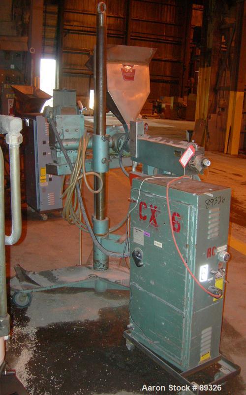 USED: Davis Standard 1.25" pedestal mounted single screw extruder, model DS1.25, approximate 24:1 L/D ratio. Electrically heated, air cooled 3 zone non-vented barrel. Water cooled feed throat with ho...