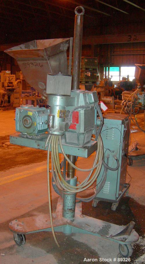 USED: Davis Standard 1.25" pedestal mounted single screw extruder, model DS1.25, approximate 24:1 L/D ratio. Electrically heated, air cooled 3 zone non-vented barrel. Water cooled feed throat with ho...
