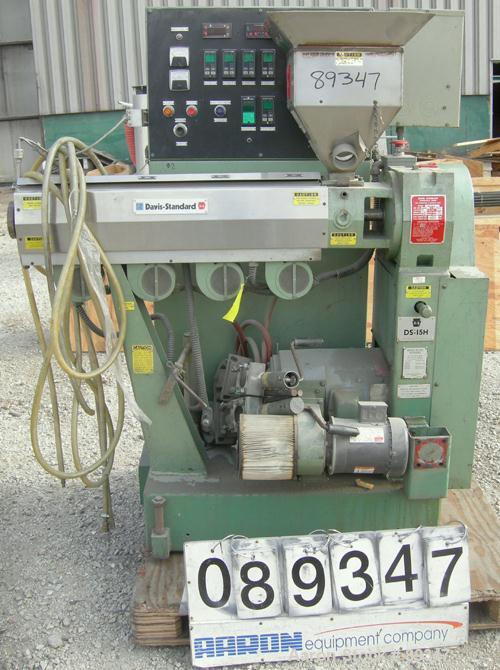 USED: Davis Standard 1.5" single screw extruder, model DS-15-H, approximate 26:1 L/D ratio. Electrically heated, air cooled 4 zone non-vented barrel. Water cooled feed throat with hopper. Driven by a...