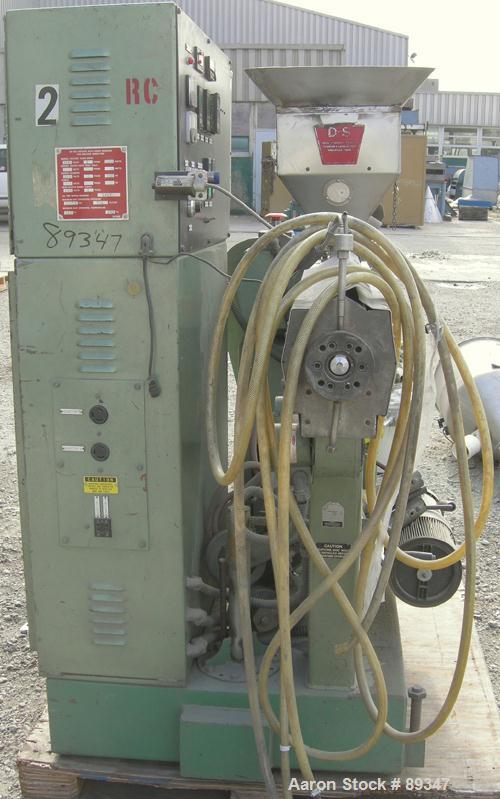 USED: Davis Standard 1.5" single screw extruder, model DS-15-H, approximate 26:1 L/D ratio. Electrically heated, air cooled 4 zone non-vented barrel. Water cooled feed throat with hopper. Driven by a...