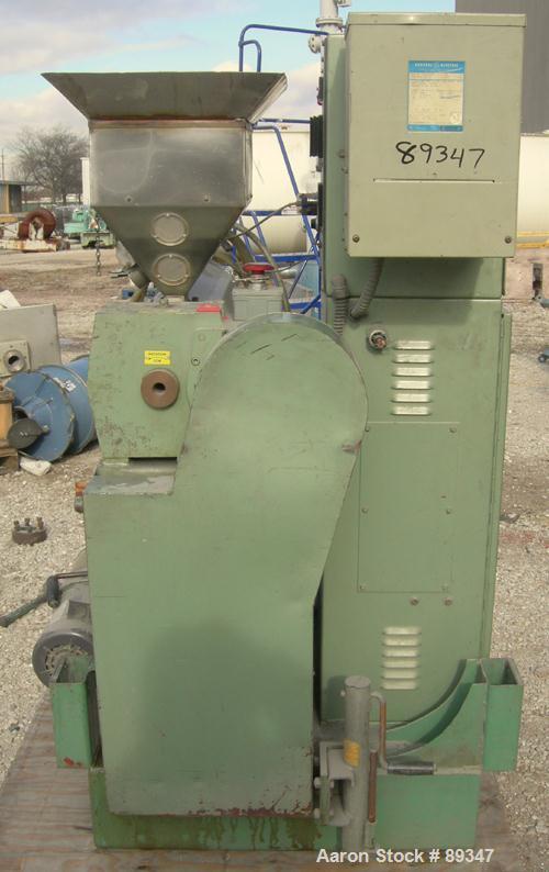 USED: Davis Standard 1.5" single screw extruder, model DS-15-H, approximate 26:1 L/D ratio. Electrically heated, air cooled 4 zone non-vented barrel. Water cooled feed throat with hopper. Driven by a...