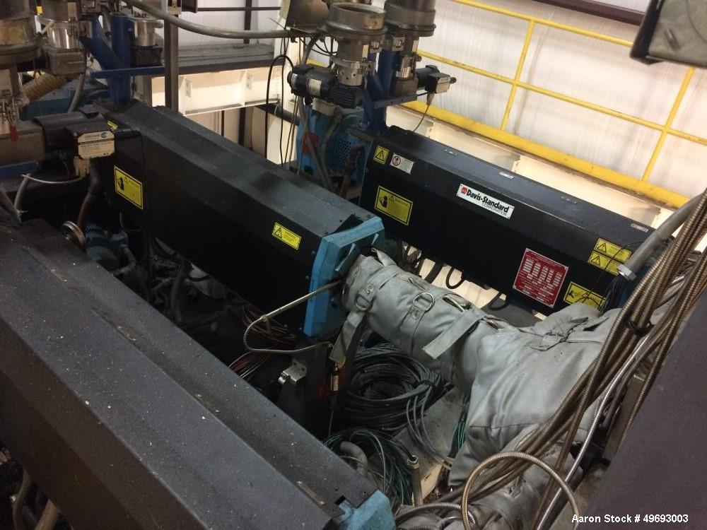 Used Davis Standard Single Screw Extruder, Model DS-15H. 1.5” screw diameter. Barrel Heater: 5 Zone/460V/2200W. Motor: 24HP/460V/3Ph. Cooling: Water. Includes: tower frame, spin beam, insulation jack...