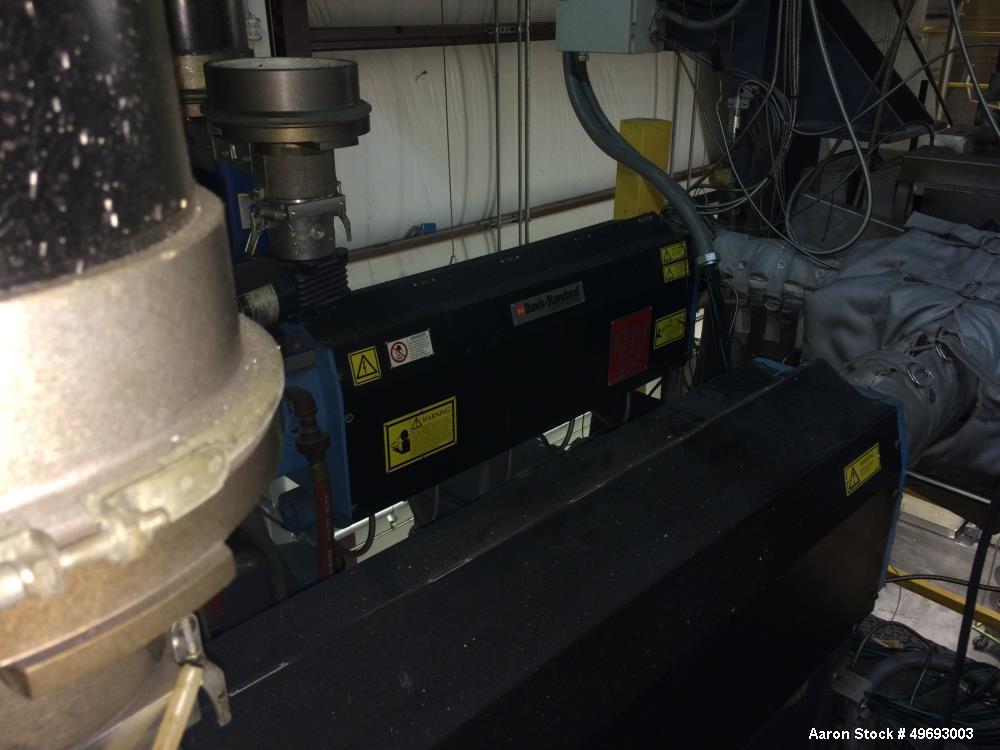 Used Davis Standard Single Screw Extruder, Model DS-15H. 1.5” screw diameter. Barrel Heater: 5 Zone/460V/2200W. Motor: 24HP/460V/3Ph. Cooling: Water. Includes: tower frame, spin beam, insulation jack...