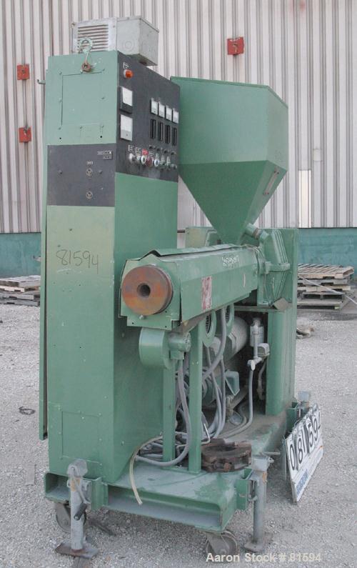 USED: Davis Standard 2" single screw extruder, model DS-20V8-24. 24:1 L/D ratio. Requires screw. Electrically heated, air cooled. 3 zone non-vented barrel. Water cooled feed throat with hopper. Drive...