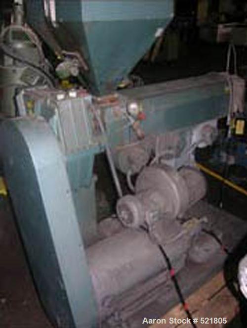 USED: 2" Davis Standard extruder, model DS-20. 24:1 L/D, electrically heated, air cooled, jacketed feed with hopper, with 20 hp motor, 6.53:1 gearbox ratio, 152 rpm screw. New 1988.