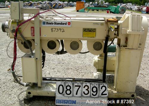 USED: Davis Standard 2" screw diameter single screw extruder, model DS-20. 30:1 L/D ratio. Electrically heated, air cooled, 4 zone non-vented barrel. Water cooled feed throat. Driven by a 20 hp, 500 ...