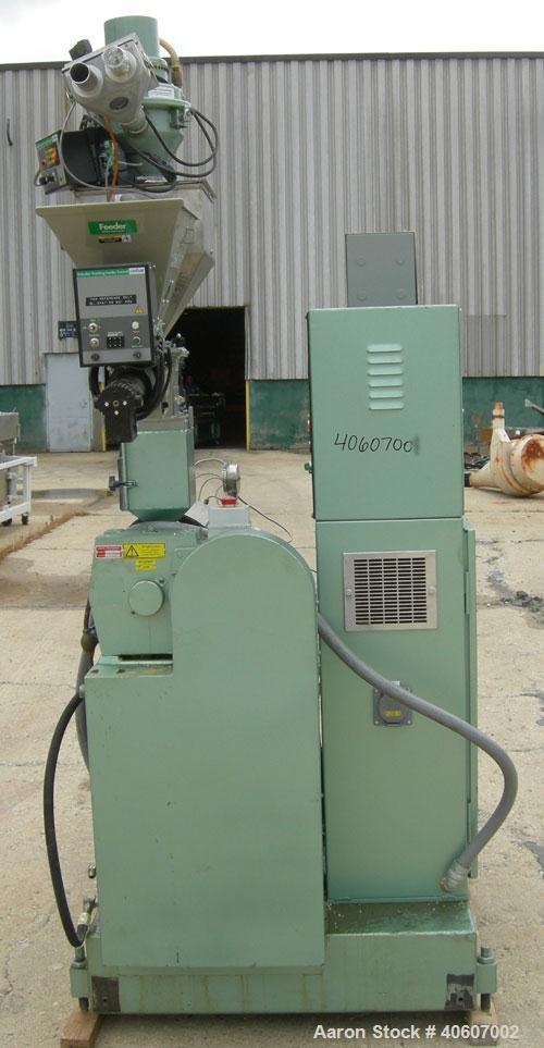 Used Davis Standard 1.25" Diameter Single Screw Extruder, Model DS12H. Approximate 24 to 1 L/D ratio, electrically heated, air cooled, non-vented 3 zone barrel. Water cooled feed with a Conair rate a...