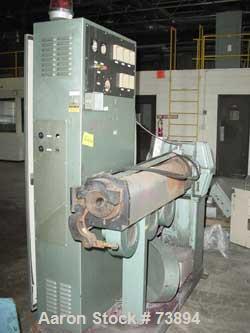 USED: Davis Standard 2" single screw extruder, model DS20. Approximate 24:1 L/D ratio. Electrically heated, air cooled. 3" x 4" water cooled feed throat, no hopper. Gearbox ratio 6.53:1. Unit require...