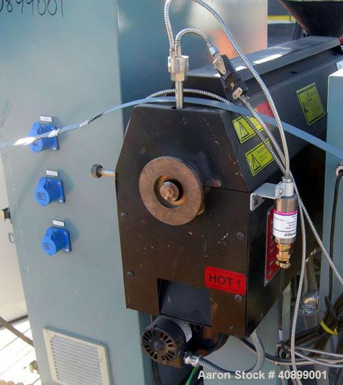 Used Davis Standard 1 1/2" Single Screw Extruder, Model KN150. Approximate 24:1 L/D ratio. Electrically heated, air cooled 3 zone non-vented barrel. Water cooled feed throat with a crammer feeder, dr...