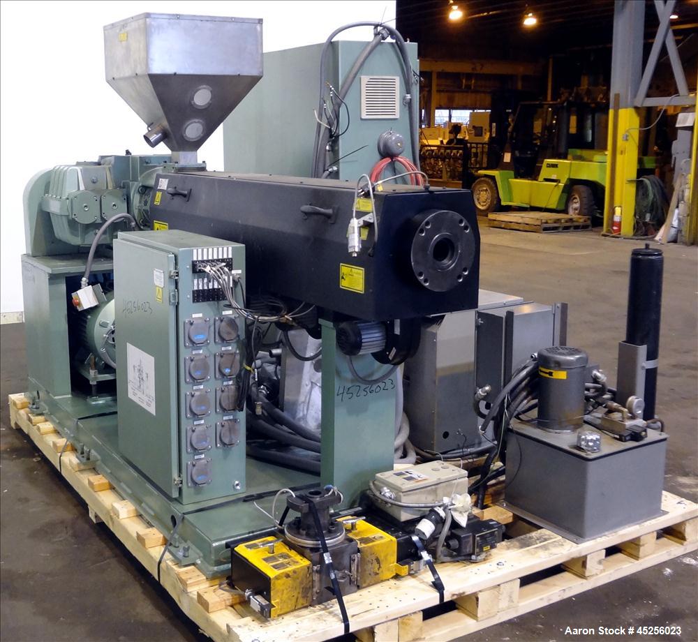 Used Davis Standard 2" Single Screw Extruder, Model KND250. Approximate 30 to 1 L/D ratio. Electrically heated, air cooled 5 zone non-vented barrel. Water cooled feed throat with hopper. Driven by a ...