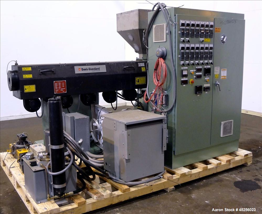 Used Davis Standard 2" Single Screw Extruder, Model KND250. Approximate 30 to 1 L/D ratio. Electrically heated, air cooled 5 zone non-vented barrel. Water cooled feed throat with hopper. Driven by a ...