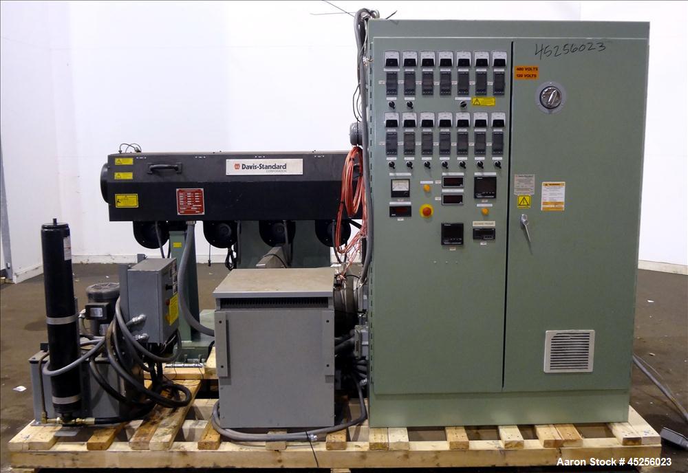 Used Davis Standard 2" Single Screw Extruder, Model KND250. Approximate 30 to 1 L/D ratio. Electrically heated, air cooled 5 zone non-vented barrel. Water cooled feed throat with hopper. Driven by a ...