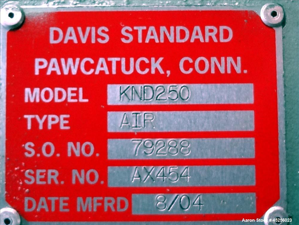 Used Davis Standard 2" Single Screw Extruder, Model KND250. Approximate 30 to 1 L/D ratio. Electrically heated, air cooled 5 zone non-vented barrel. Water cooled feed throat with hopper. Driven by a ...