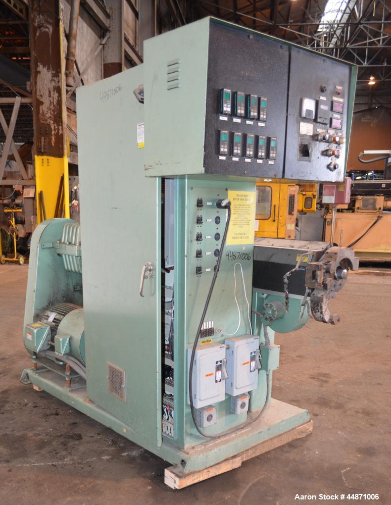 Used Davis Standard 2-1/2" Single Screw Extruder.  Approximately 24 to 1 L/D ratio. Electrically heated, air cooled 4 zone non-vented barrel, water cooled feed throat with hopper.  Driven by a 40 hp,...