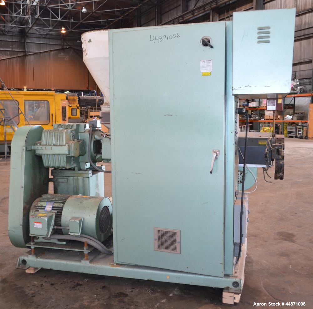 Used Davis Standard 2-1/2" Single Screw Extruder.  Approximately 24 to 1 L/D ratio. Electrically heated, air cooled 4 zone non-vented barrel, water cooled feed throat with hopper.  Driven by a 40 hp,...
