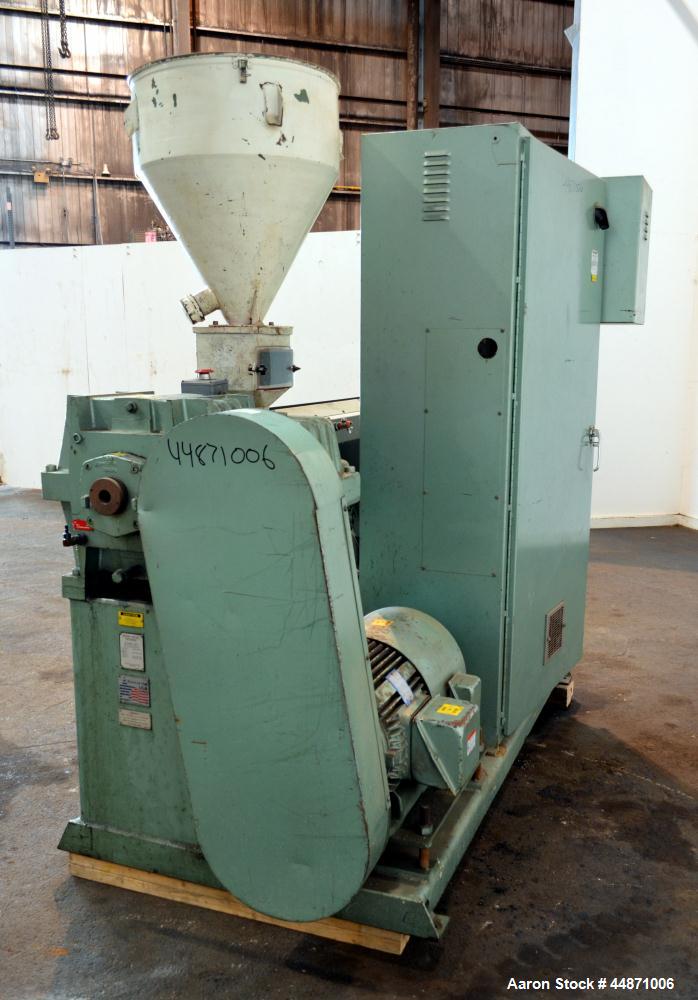 Used Davis Standard 2-1/2" Single Screw Extruder.  Approximately 24 to 1 L/D ratio. Electrically heated, air cooled 4 zone non-vented barrel, water cooled feed throat with hopper.  Driven by a 40 hp,...