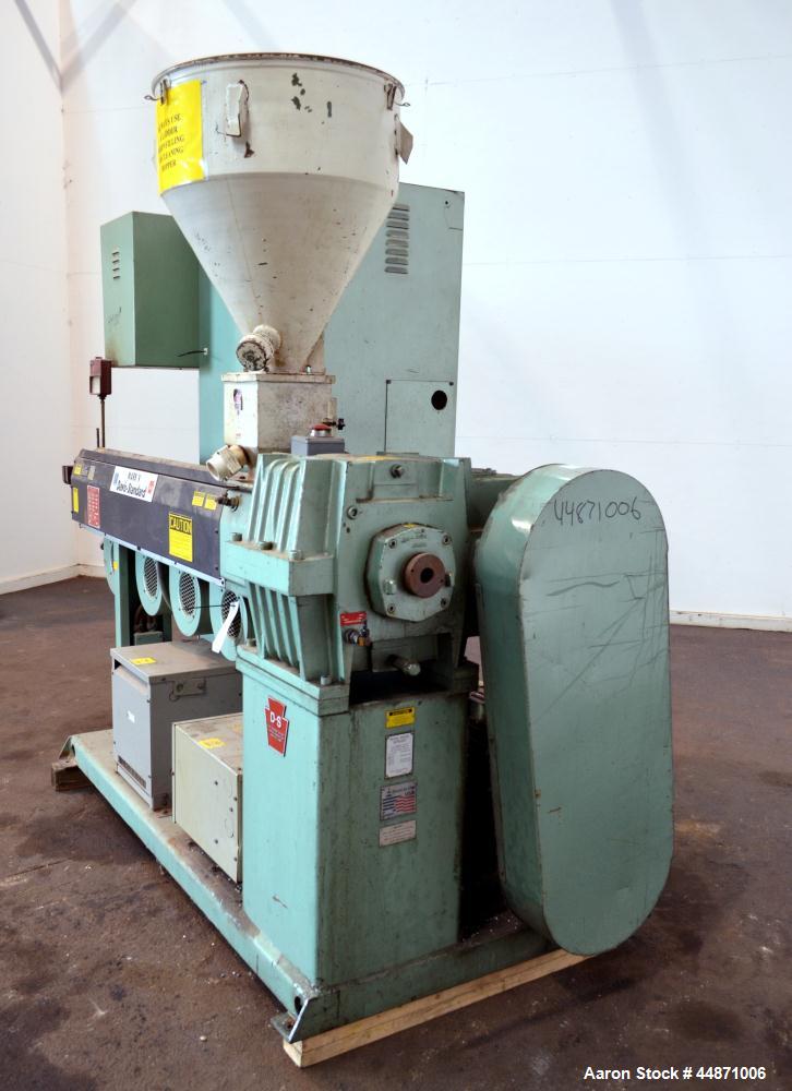 Used Davis Standard 2-1/2" Single Screw Extruder.  Approximately 24 to 1 L/D ratio. Electrically heated, air cooled 4 zone non-vented barrel, water cooled feed throat with hopper.  Driven by a 40 hp,...