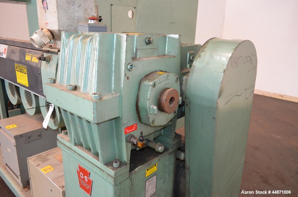 Used Davis Standard 2-1/2" Single Screw Extruder.  Approximately 24 to 1 L/D ratio. Electrically heated, air cooled 4 zone non-vented barrel, water cooled feed throat with hopper.  Driven by a 40 hp,...