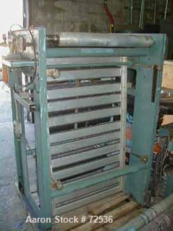 USED: Davis Standard-Filmaster 2" lowboy air cooled extruder, 24:1 L/Dratio. Belt driven by a 20 hp motor and gearbox. Has hopper, clamp,heat control panel and drive panel.