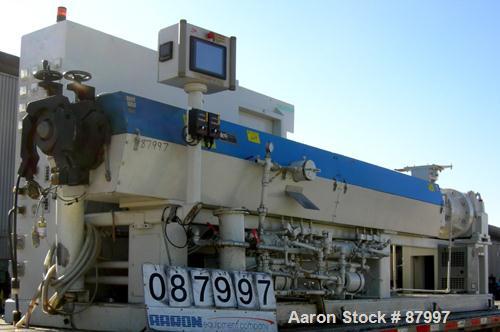 Used Deltaplast Machinery 4.5" Single Screw Extruder, Model D130:450:34. Approximately 34:1 L/D ratio. Electrically heated, water cooled, 8 zone, side vented barrel. Closed loop system with (2) pumps...
