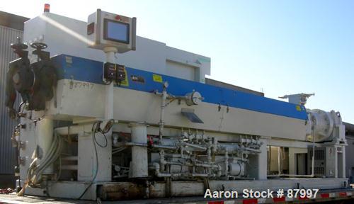 Used Deltaplast Machinery 4.5" Single Screw Extruder, Model D130:450:34. Approximately 34:1 L/D ratio. Electrically heated, water cooled, 8 zone, side vented barrel. Closed loop system with (2) pumps...