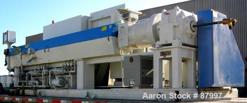 Used Deltaplast Machinery 4.5" Single Screw Extruder, Model D130:450:34. Approximately 34:1 L/D ratio. Electrically heated, water cooled, 8 zone, side vented barrel. Closed loop system with (2) pumps...