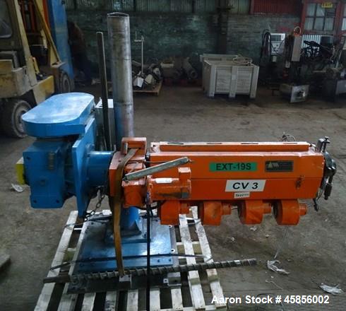 Used Deltaplast 2" Single Screw Cold Feed Extruder. Approximately 24 to 1 L/D ratio, electrically heated, air cooled barrel. Jacketed feed section, pedestal mounted with power roll strip feeder drive...