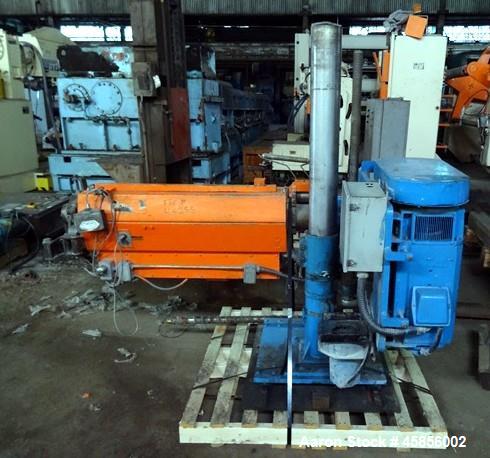 Used Deltaplast 2" Single Screw Cold Feed Extruder. Approximately 24 to 1 L/D ratio, electrically heated, air cooled barrel. Jacketed feed section, pedestal mounted with power roll strip feeder drive...