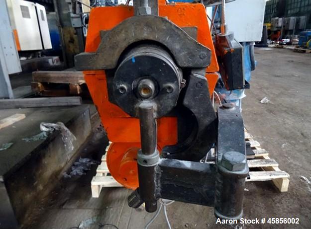 Used Deltaplast 2" Single Screw Cold Feed Extruder. Approximately 24 to 1 L/D ratio, electrically heated, air cooled barrel. Jacketed feed section, pedestal mounted with power roll strip feeder drive...