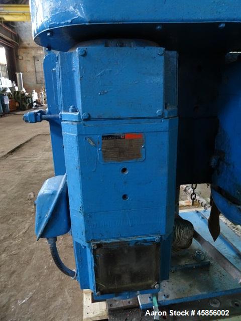 Used Deltaplast 2" Single Screw Cold Feed Extruder. Approximately 24 to 1 L/D ratio, electrically heated, air cooled barrel. Jacketed feed section, pedestal mounted with power roll strip feeder drive...