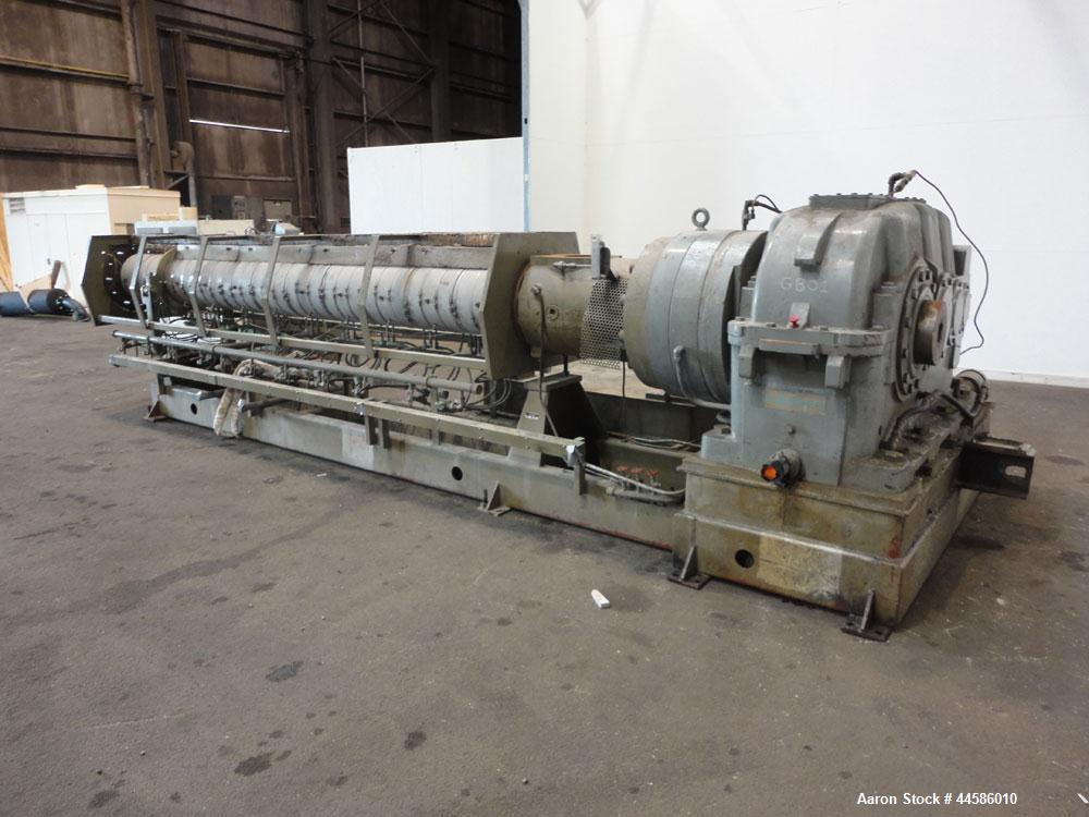 Used Egan Machinery 8" Single Screw Extruder, Model B0-08038-01. Approximately 24 to 1 L/D ratio. Electrically heated, water cooled 11 zone non-vented barrel with pump and holding tank.  Water cooled...