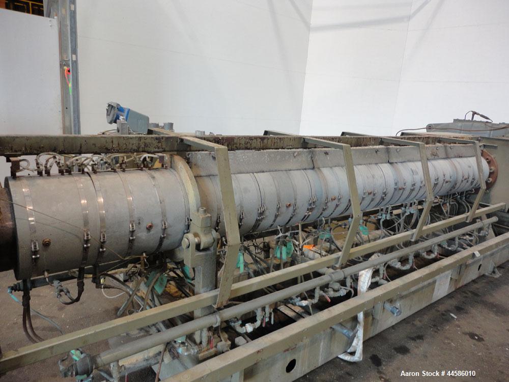 Used Egan Machinery 8" Single Screw Extruder, Model B0-08038-01. Approximately 24 to 1 L/D ratio. Electrically heated, water cooled 11 zone non-vented barrel with pump and holding tank.  Water cooled...