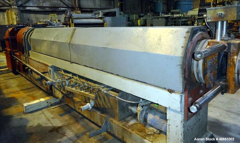 Used Egan Machinery 6" Single Screw Extruder. Approximate 22 to 1 L/D ratio, electrically heated, water cooled 7 zone non-vented barrel with pump, tank, and heat exchanger. Water cooled feed throat, ...