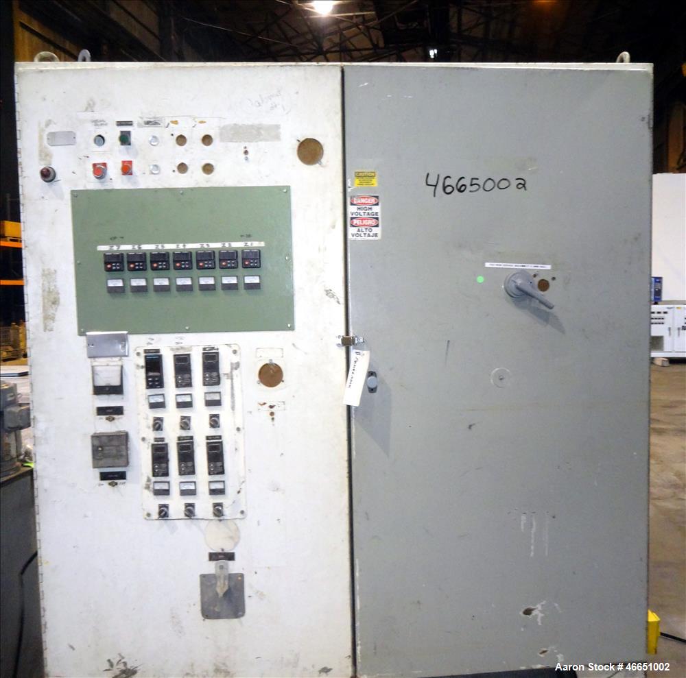 Used Egan Machinery 6" Single Screw Extruder. Approximate 22 to 1 L/D ratio, electrically heated, water cooled 7 zone non-vented barrel with pump, tank, and heat exchanger. Water cooled feed throat, ...
