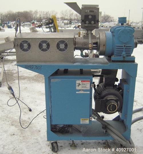 Used Genca Single Screw Extruder, Model EB 100245HF2001WE9179, 1" Screw diameter approximate 28:1 L/D ratio, electrically heated, air cooled, non-vented 3 zone barrel. Water cooled feed with a magnet...