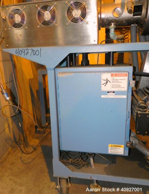 Used Genca Single Screw Extruder, Model EB 100245HF2001WE9179, 1" Screw diameter approximate 28:1 L/D ratio, electrically heated, air cooled, non-vented 3 zone barrel. Water cooled feed with a magnet...