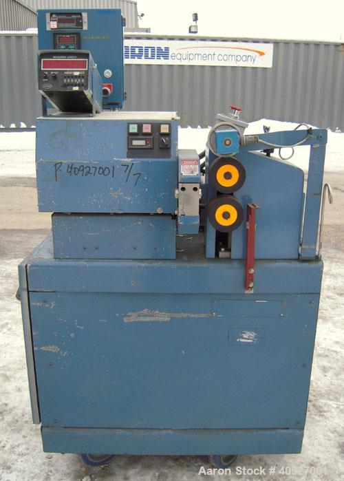 Used Genca Single Screw Extruder, Model EB 100245HF2001WE9179, 1" Screw diameter approximate 28:1 L/D ratio, electrically heated, air cooled, non-vented 3 zone barrel. Water cooled feed with a magnet...
