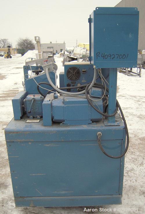 Used Genca Single Screw Extruder, Model EB 100245HF2001WE9179, 1" Screw diameter approximate 28:1 L/D ratio, electrically heated, air cooled, non-vented 3 zone barrel. Water cooled feed with a magnet...