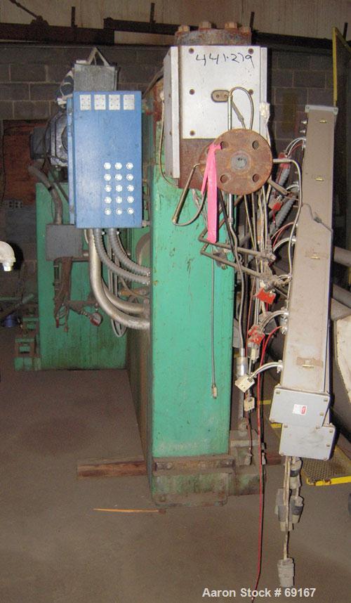 Used Gloucester 3-1/2" Single Screw Extruder, Model 233-001. Approximately 30 to 1 L/D ratio. Electrically heated, water cooled barrel. Driven by a 100 hp DC motor thru a gearbox, ratio 15.398 to 1. ...