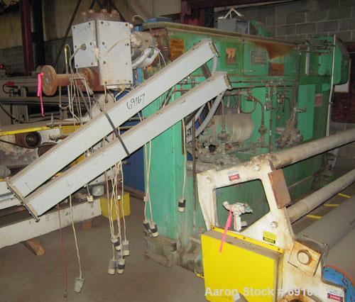 Used Gloucester 3-1/2" Single Screw Extruder, Model 233-001. Approximately 30 to 1 L/D ratio. Electrically heated, water cooled barrel. Driven by a 100 hp DC motor thru a gearbox, ratio 15.398 to 1. ...